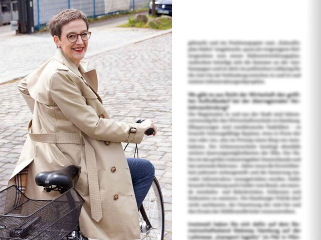 individuelles Portrait einer Geschäftsführerin auf ihrem Fahrrad für die Titelstory der Hamburger Wirtschaft